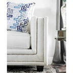 Tigg Contemporary White Chenille Nailhead Upholstered Sofa by